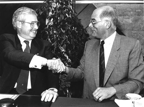 In 1988 zocht Schuitema bescherming onder de paraplu van Ahold tegen pogingen van Unigro-topman Eric Albada Jelgersma om het bedrijf vijandig over te nemen. Hier schudden Albert Heijn en Ide Vos de hand op de gesloten deal. Schuitema maakte zich pas in 2009 weer los van Ahold.