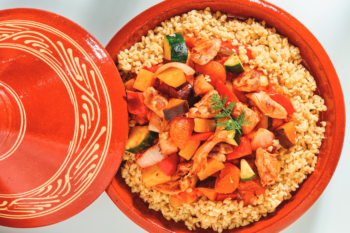 Tajine met kip en bulgur. Foto: Anur/Wahid