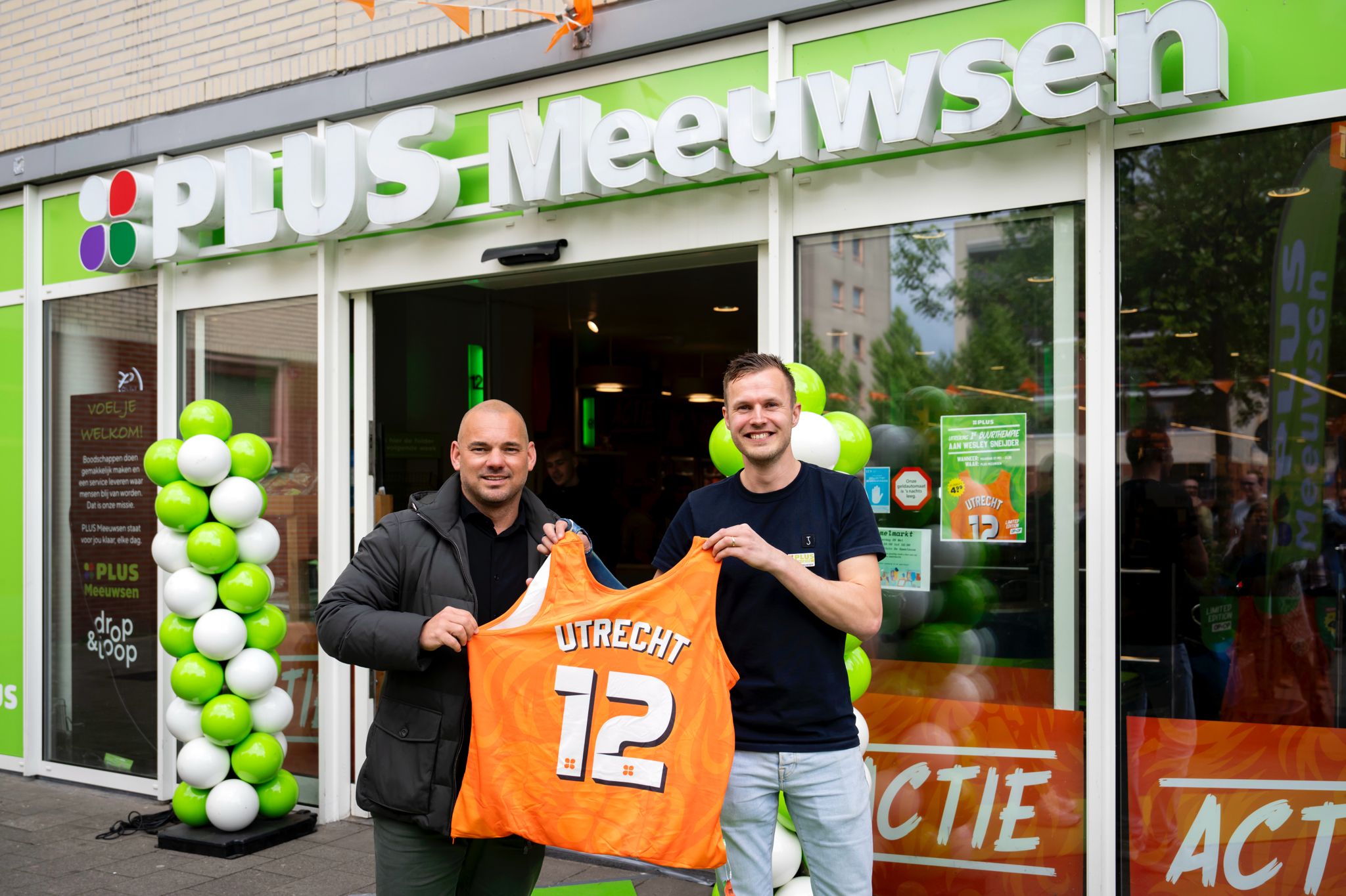 Wesley Sneijder en Plus-ondernemer Marco Meeuwsen. Foto: Plus