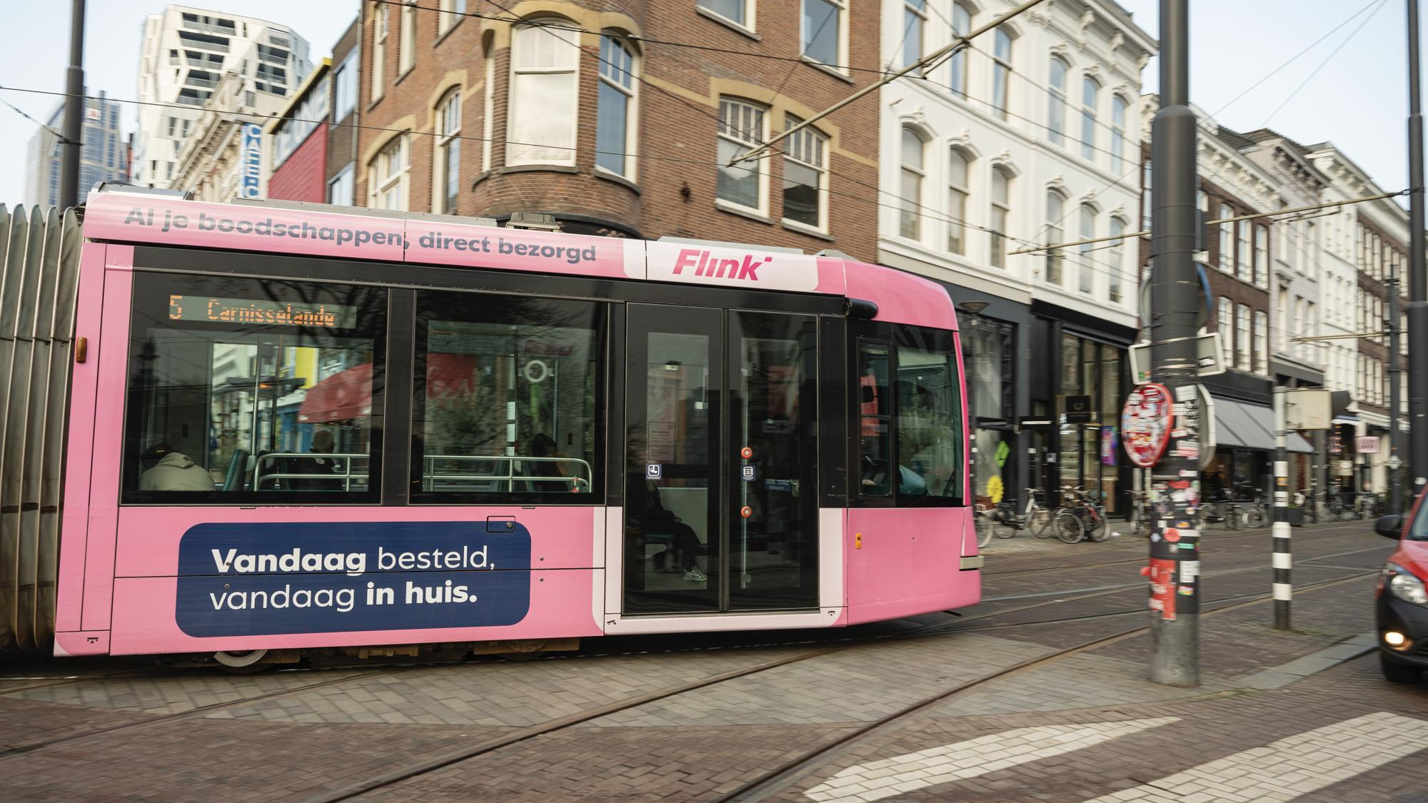 Een Flink-reclame in Rotterdam. Foto: Flink