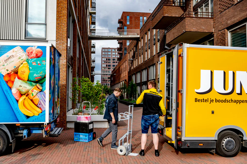 Bezorgers van AH en Jumbo. Foto: ANP