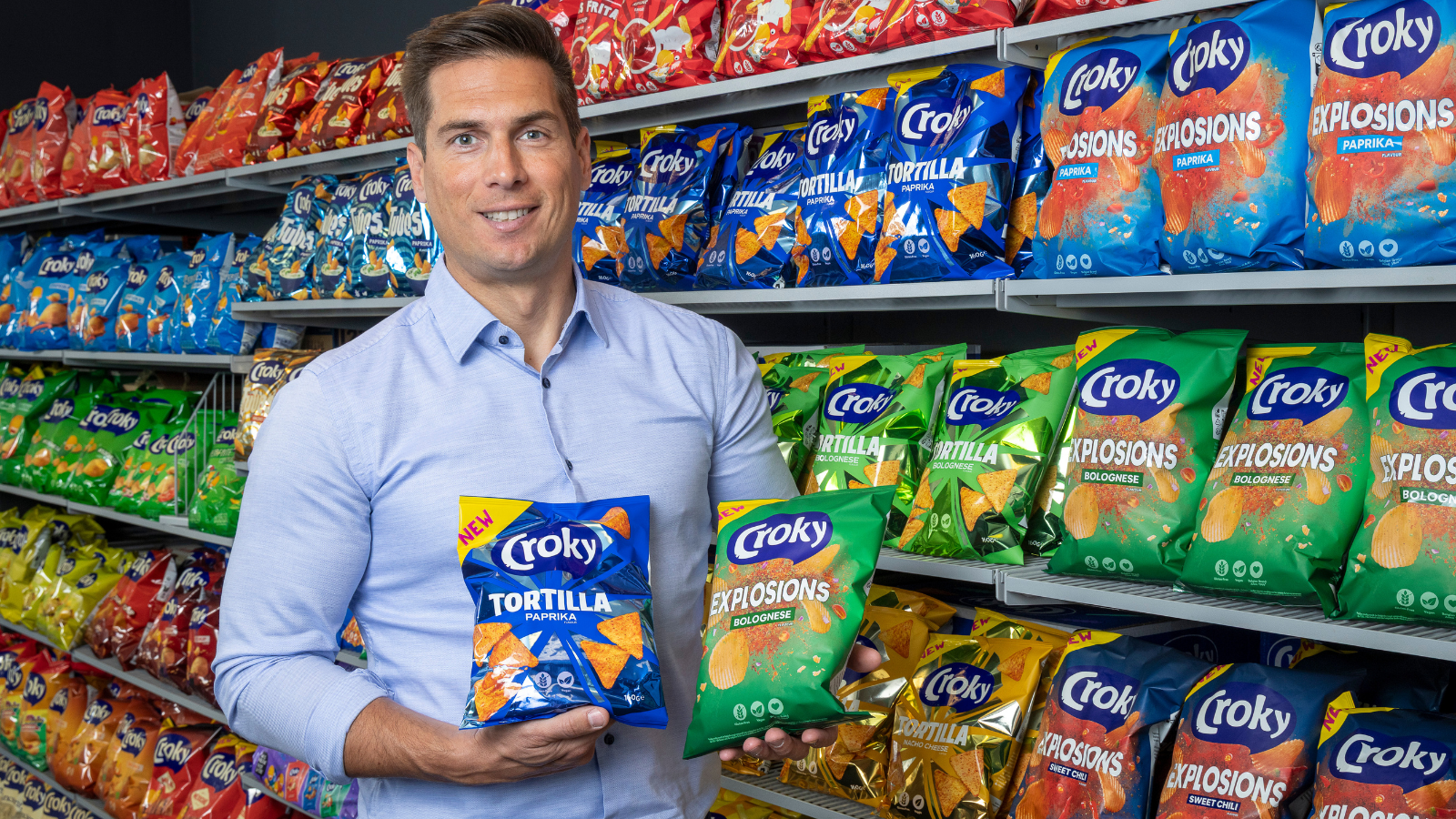 Chief Croky Officer Wim Gallet met de Paprika en Bolognese smaak op de focus productlijnen van Croky; Tortilla en Explosions.